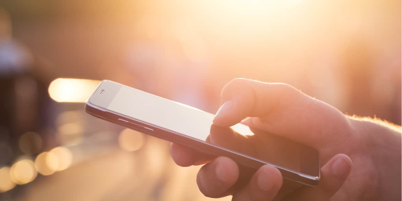 person on iphone